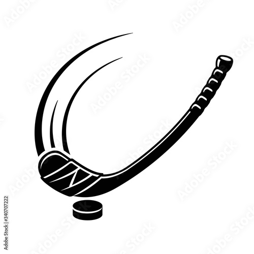 Hockey stick hitting hockey puck