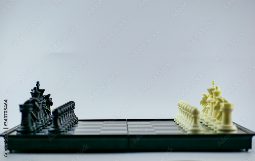 Obraz premium A chessboard with pieces displayed on it.