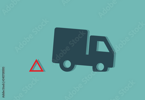 Truck with red warning triangle