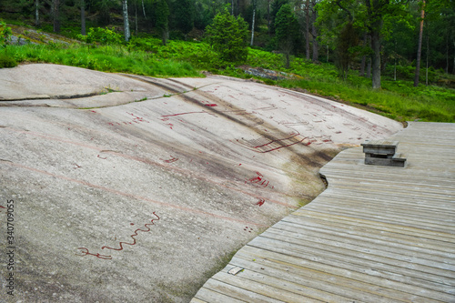 Фотография Rock Carvings from Bronze Age, which are about 3000 years old, located at one time on the shores of the fjord, now a UNESCO World Heritage Site