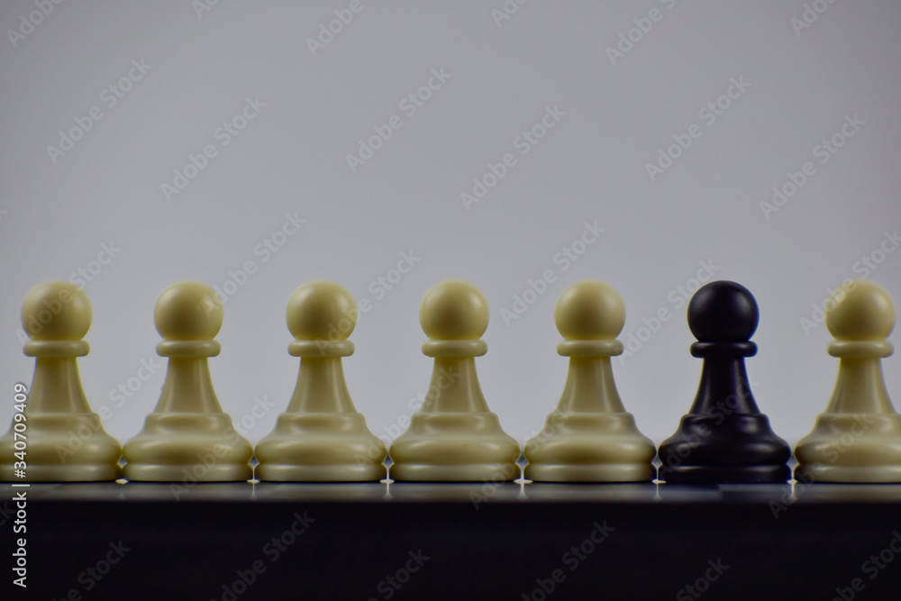 Opposition of white and black chess pawns. Opposition of white and black chess pawns.
