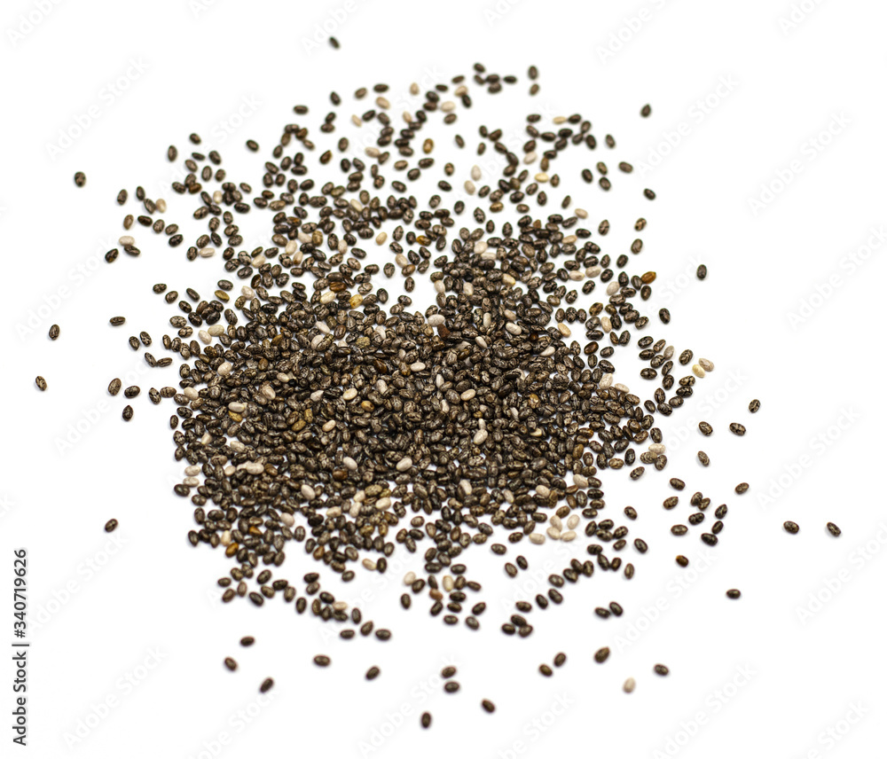 dark Chia seeds isolated on a white background. small grains of Spanish sage, similar to beans, taste like a nut, gray-white-black color with a relief pattern. health product dark Chia seeds isolated on a white background. small grains of Spanish sage, similar to beans, taste like a nut, gray-white-black color with a relief pattern. health product
