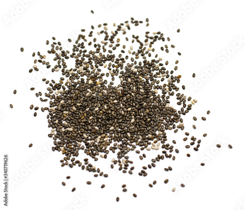 dark Chia seeds isolated on a white background. small grains of Spanish sage, similar to beans, taste like a nut, gray-white-black color with a relief pattern. health product