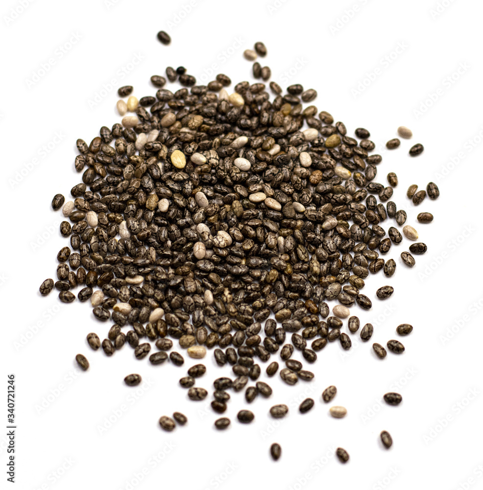 dark Chia seeds isolated on a white background. small grains of Spanish sage, similar to beans, taste like a nut, gray-white-black color with a relief pattern. health product dark Chia seeds isolated on a white background. small grains of Spanish sage, similar to beans, taste like a nut, gray-white-black color with a relief pattern. health product