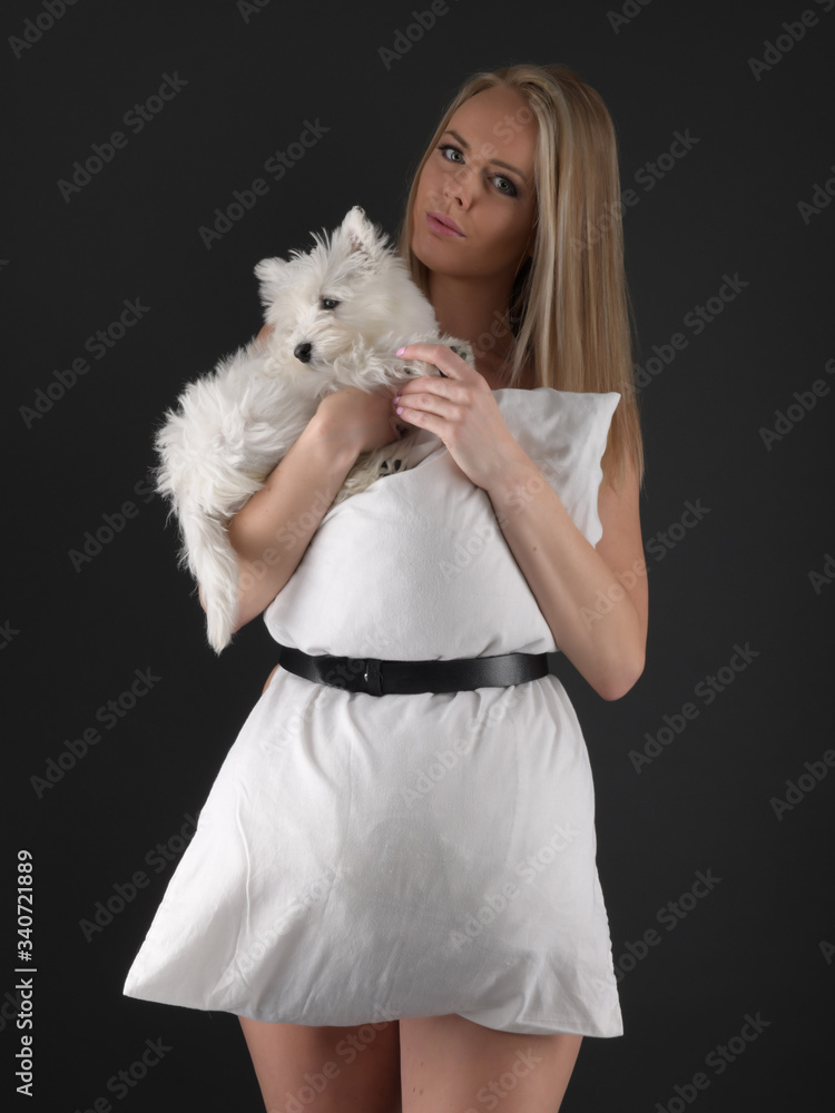 Young woman with West Highland White Terrier Young woman with West Highland White Terrier