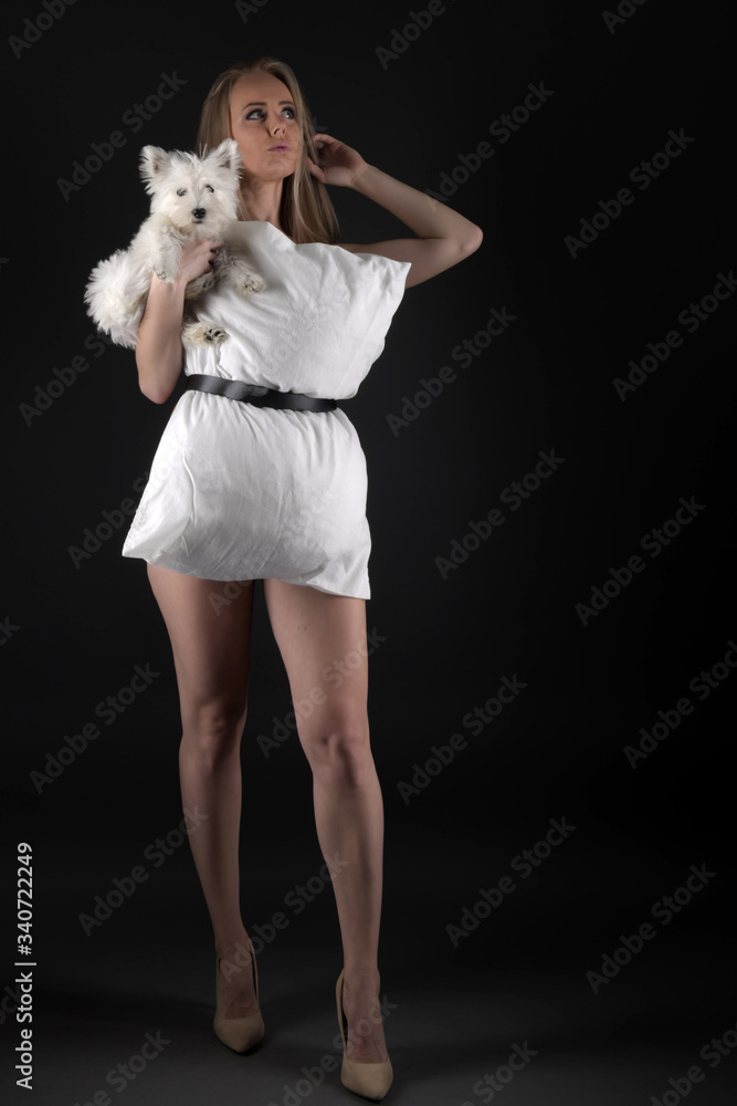 Young woman with West Highland White Terrier Young woman with West Highland White Terrier