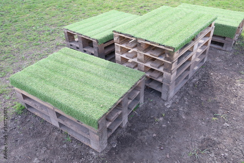 Eco-friendly furniture made of pallets. Table and seats made of pallets