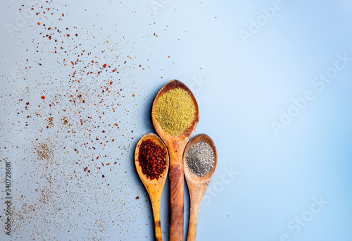 Fototapeta Naklejka Na Ścianę i Meble -  Various spices in wooden spoon 