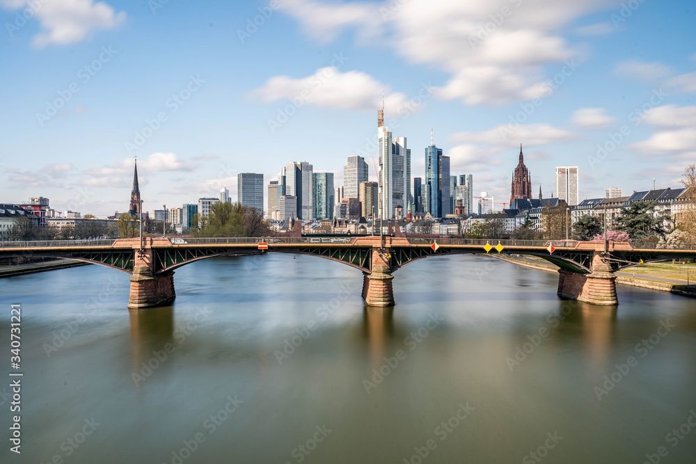 Frankfurt, Germany - March 31, 2020: frankfurt skyline view with ignas bubis bridge during daytime