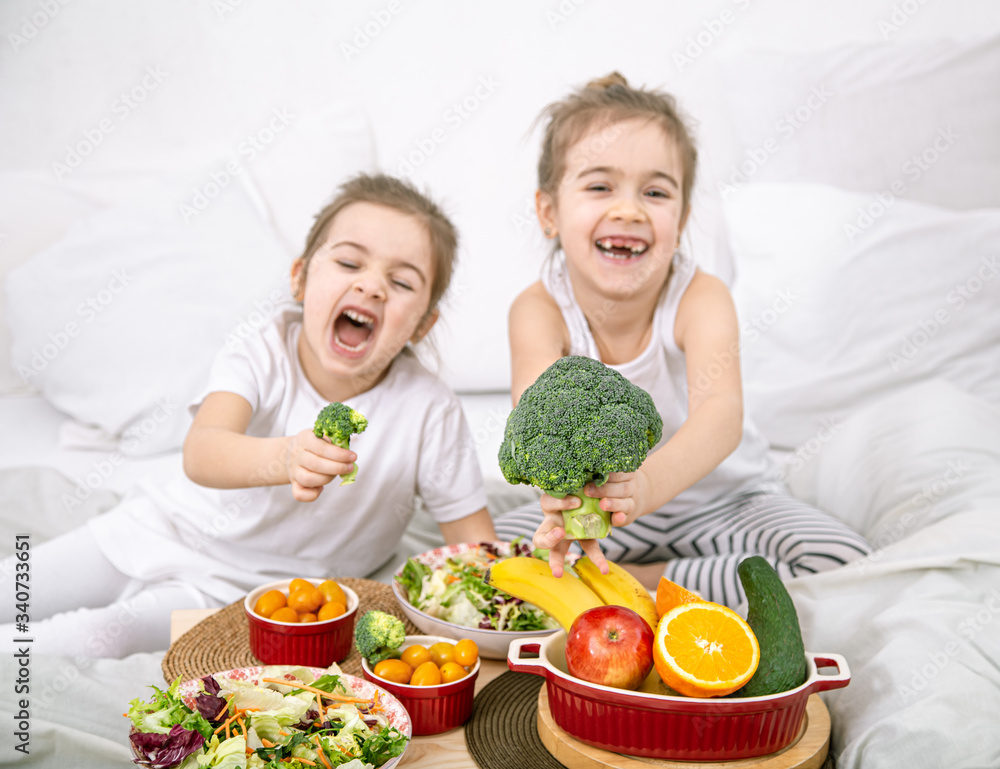 Healthy food, children eat fruits and vegetables.