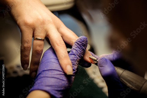 Women do manicures at home. Self-isolation manicure. Nail salon