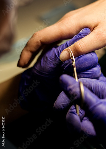 Women do manicures at home. Self-isolation manicure. Nail salon