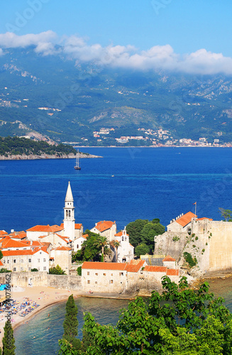 Panoramic view of the Budva Riviera travel destination from the beach Mogrenof the fortress of the Old Town. Budva - one of the best preserved medieval cities in the Mediterranean, Montenegro, Europe