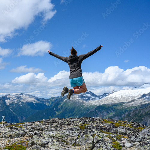 Woman Soars Over Rocky Overlook in North Cascades