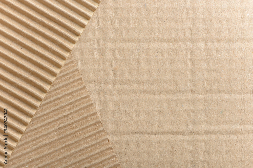 Carton or cardboard packing material. Texture of corrugated paper sheets  made from cellulose. Supplies for creating boxes and packaging. Pasteboard  background. Natural brown cardboard surface. Stock Photo | Adobe Stock