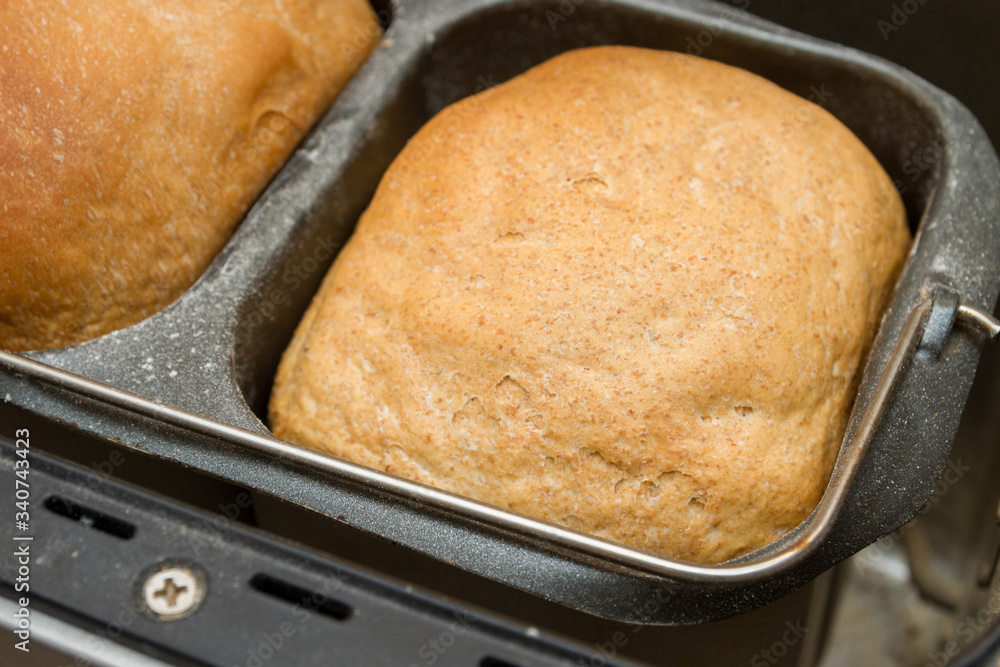 Homemade bread is baked in a bread maker Homemade bread is baked in a bread maker