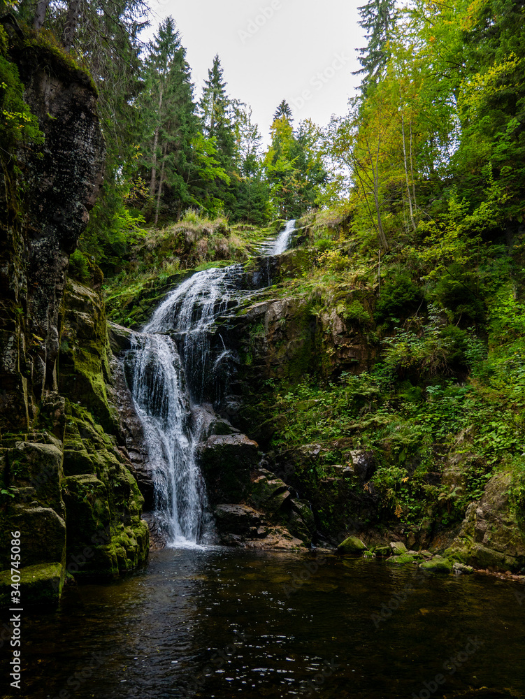 Kamienczyk mountain waterfall in early autumn Kamienczyk mountain waterfall in early autumn