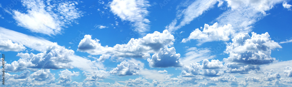 Obraz premium Blue sky with white clouds in summer. Panorama, large size