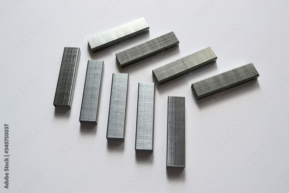 Metal staples for stapler on white background Metal staples for stapler on white background