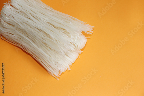 rice noodles on an orange background