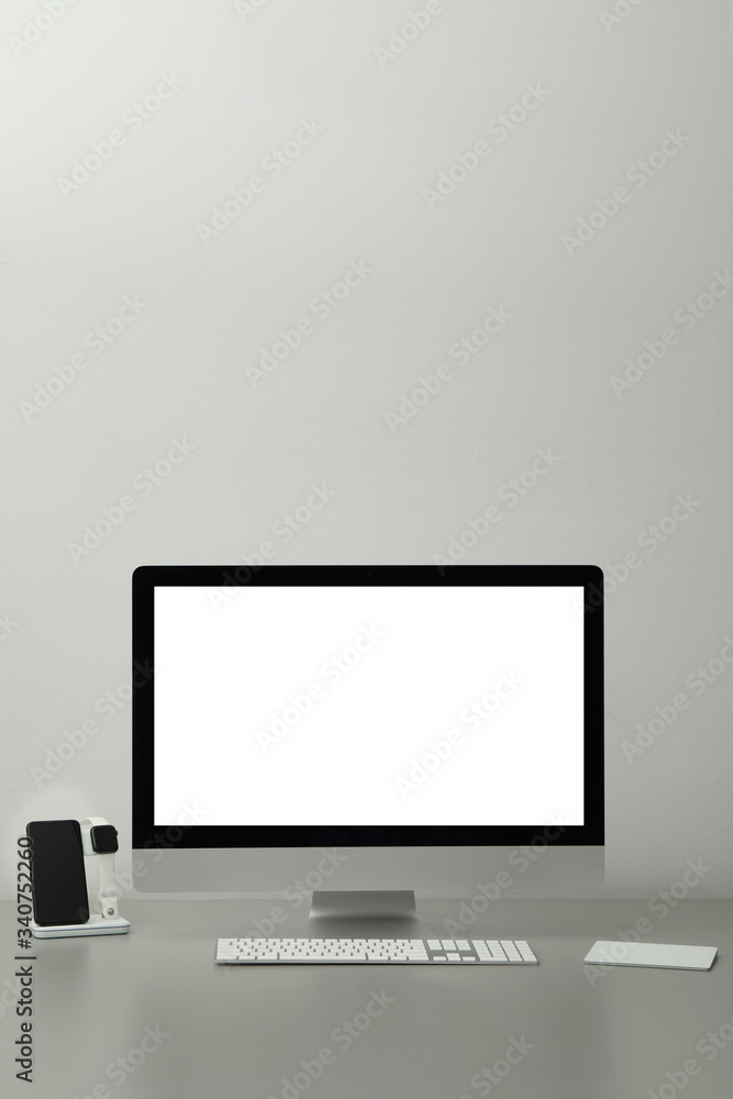 Modern workplace with computer and charging devices. Interior design Modern workplace with computer and charging devices. Interior design