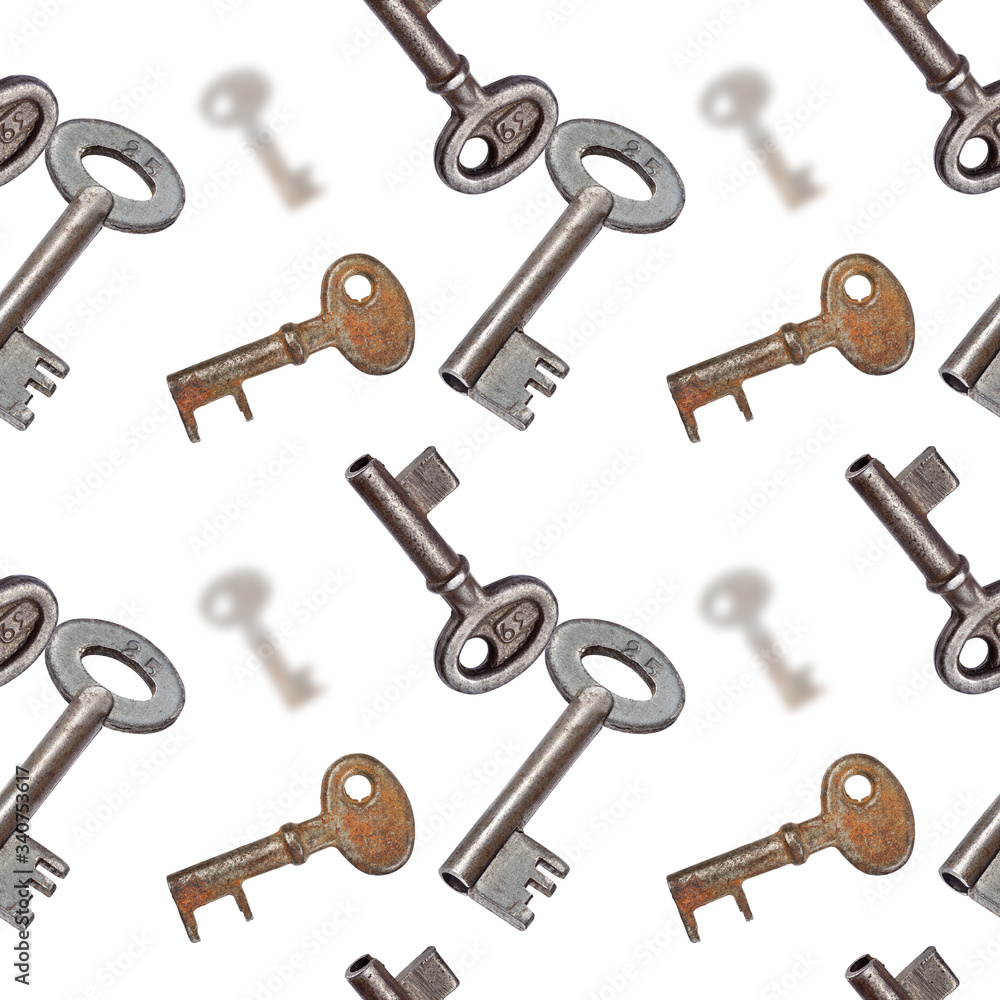 Old keys on white seamless texture or pattern Old keys on white seamless texture or pattern