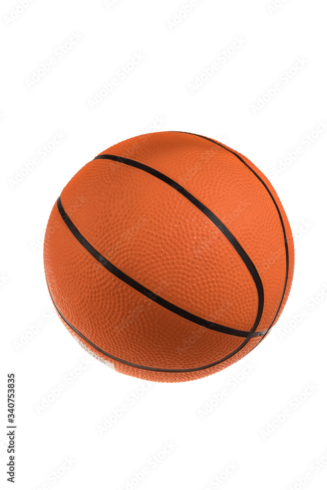 Rubber orange basketball with black lines, isolated on white background