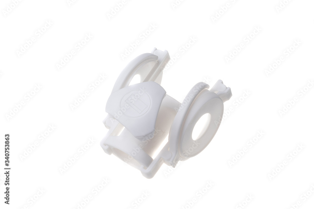 Plastic white umbrella folded cup holder, isolated on white background Plastic white umbrella folded cup holder, isolated on white background