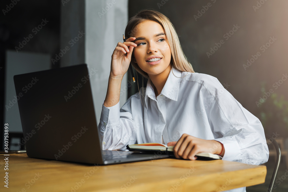 Girl studying in front of laptop at home. Distant education for isolated young people. Opportunities to improve skills Girl studying in front of laptop at home. Distant education for isolated young people. Opportunities to improve skills