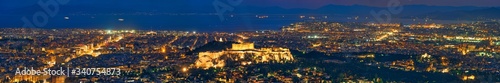 Famous greek tourist landmark - the iconic Athens view and Parthenon Temple at the Acropolis of Athens and panorama of Athenes as seen from Mount Lycabettus, Athens, Greece photo