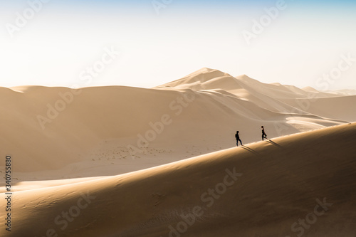 Lovely couple dancing on dune 7