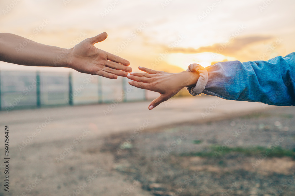 couple holding hands. Hands man and woman. Sensual. Love photo. Sunset. Background. couple holding hands. Hands man and woman. Sensual. Love photo. Sunset. Background.
