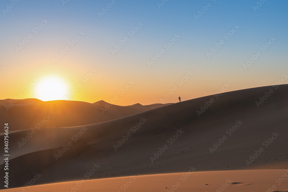 Sunset on dune 7 in namibia desert