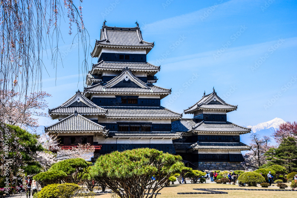 Iconic Matsumoto castle built in traditional japanese style in the middle of high mountain Iconic Matsumoto castle built in traditional japanese style in the middle of high mountain