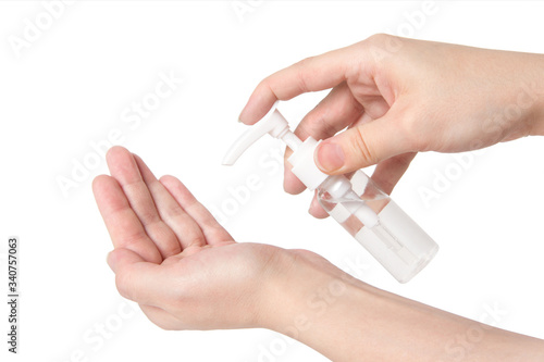 Hand antibacterial sanitizer dispenser pump, alcohol gel to wash hands, liquid soap to clean hands free from viruses and diseases. Please wash your hands concept photo of handwashing isolated on white