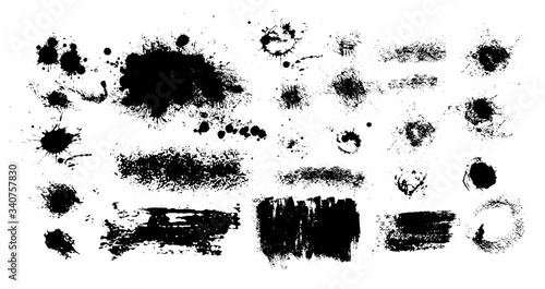 Set of blots. Black spots of paint on a white background. Grunge frame of paint. Vector