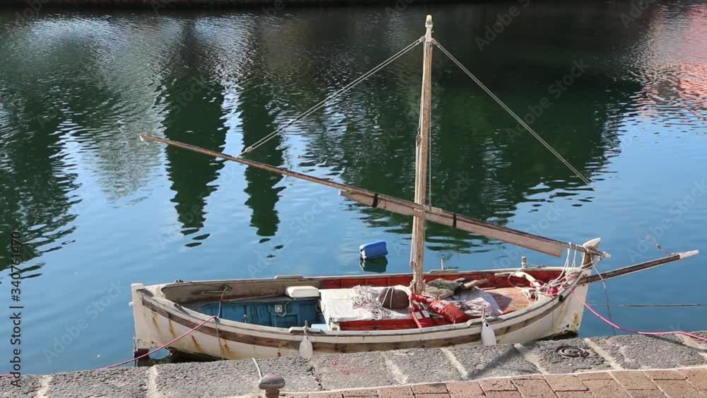 latin fishing boat  by the river