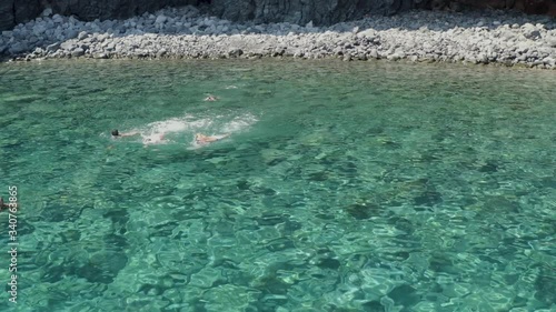 Wallpaper Mural The sea of ​​Pantelleria with its jagged and volcanic coast. Turquoise colored sea. Dammusi, typical houses of Pantelleria. Torontodigital.ca