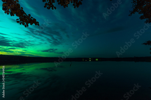 Fototapeta Naklejka Na Ścianę i Meble -  Amazing green sky over the mazurian lake Śniardwy, the biggest lake in Poland, longexposure.