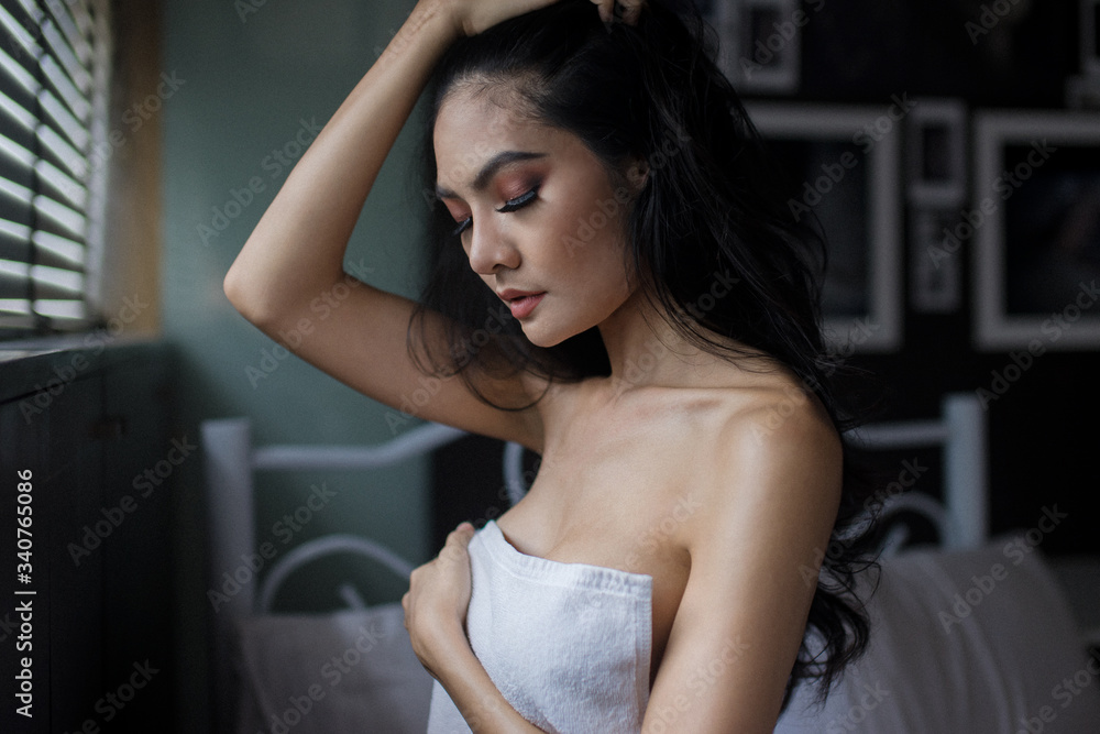 Lonely Naked sexy woman sitting in bathroom. sensual beautiful female at home Lonely Naked sexy woman sitting in bathroom. sensual beautiful female at home