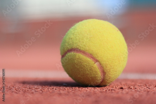 tennis ball on the court © Bilal