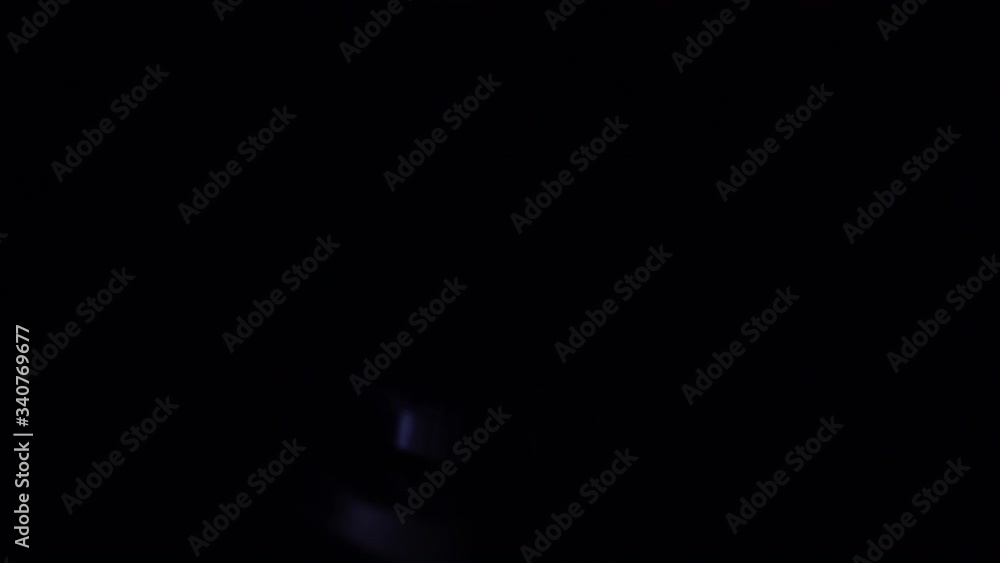 The gas burner switches off in the dark. Stove works at the household gas. The flame is blue. The gas burner switches off in the dark. Stove works at the household gas. The flame is blue.