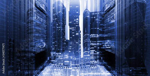 concept of the modern digital world, business buildings of the night metropolis against the background of data center servers. Double exposure