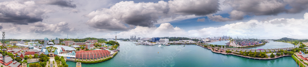Sentosa Island, Singapore. Panoramic aerial view of cityscape and coastline at sunset