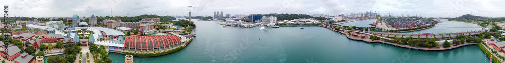 SENTOSA, SINGAPORE - JANUARY 2020: Universal Studios and city skyline, panoramic view