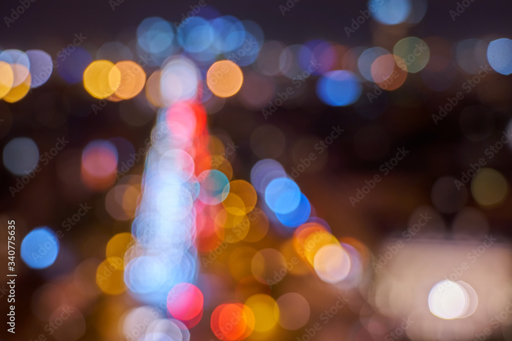 Night city lights bokeh. Colorful circles. Background.