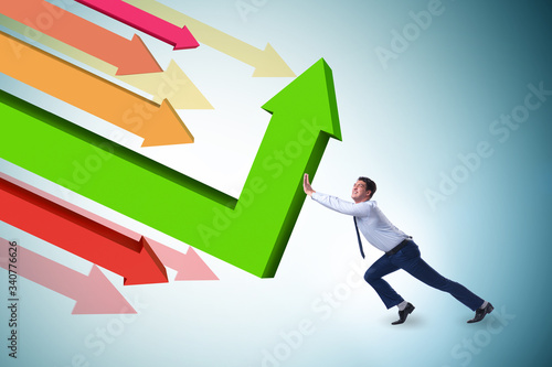 Fotografie Recovery concept with businessman and charts