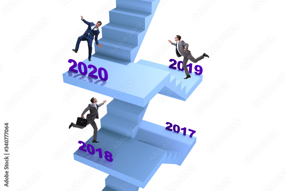 Businessman climbing stairs on yearly basis Businessman climbing stairs on yearly basis