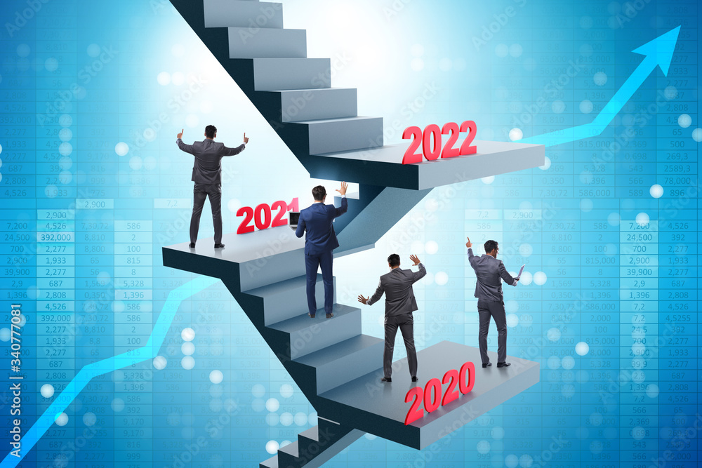 Businessman climbing stairs on yearly basis Businessman climbing stairs on yearly basis