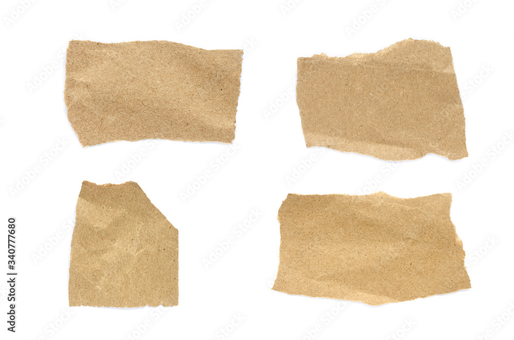 torn paper isolated on white background. Brown paper torn or ripped pieces of paper isolated on white background.